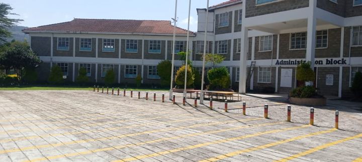Side view of a school administration block and courtyard