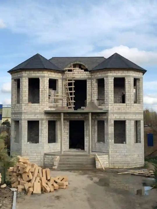 Stone maisonette shell with corner bays
