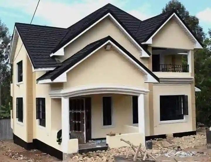 Rendered and painted pitched-roof townhouse in the finishing stage